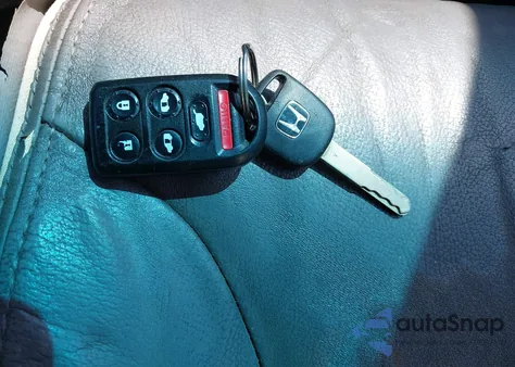 2009 Honda Odyssey Ex-L из США, поврежденный, VIN 5FNRL38719B052351